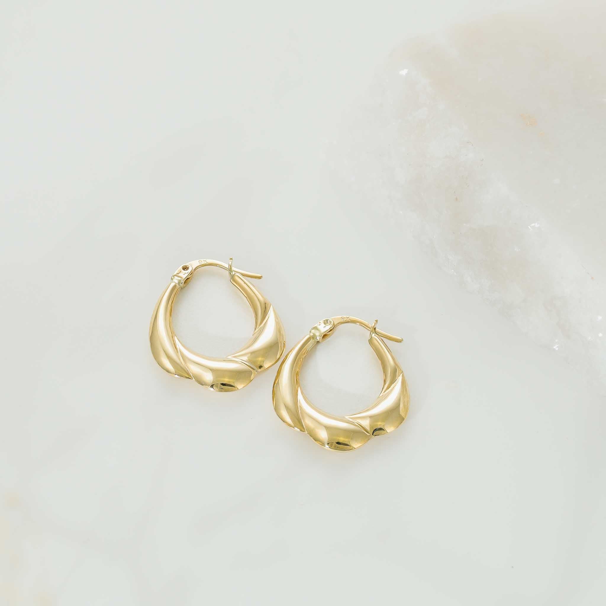 Reflecting the Beauty of Simplicity 9 Carat Gold Earrings Crafted to Inspire